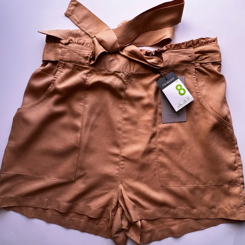 Dress shorts, yellow size 8 . PRIMARK CARES